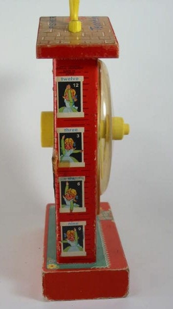 Vintage Fischer Price Music Teaching Clock Toy