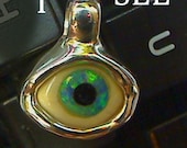 i see you Eye Pendant 3 natural materials set in sterling silver my skull hurts this was so hard to make