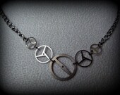 gearing minds. steampunk vintage watch cog necklace. DC166