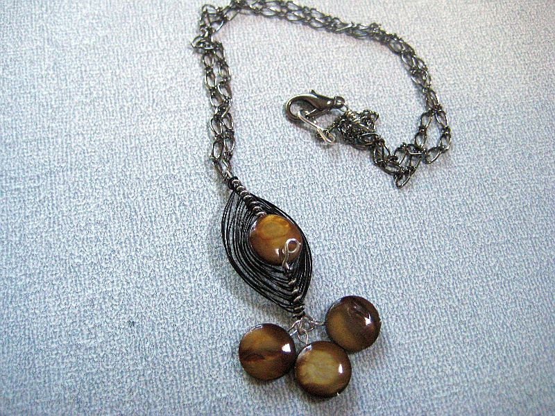 Wire wrapped  necklace in brown tiger iron, silver and black