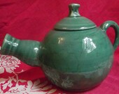Super adorable tea pot, metallic green/blue undertones
