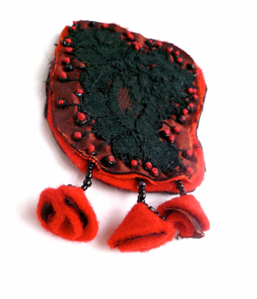 SALE Pinned black heart, wearable fiber art hand stitched felt pin