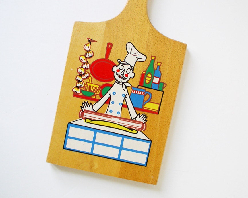 Vintage cutting board with illustrated chef
