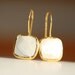 Creamy White Mother of Pearl Earrings in Gold