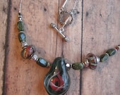 Unique Glass choker Fall Forest  Pendant Peacock Kaleidoscope of Color Teal and Cranberry
