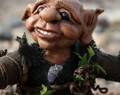 Elf Art Doll, Kalju, the desert dwelling elf who makes heart shaped rocks.