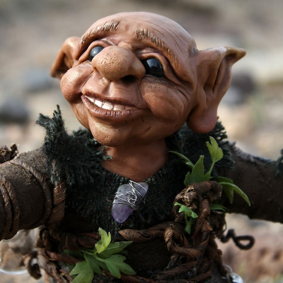 Elf Art Doll, Kalju, the desert dwelling elf who makes heart shaped rocks.
