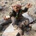 Elf Art Doll, Kalju, the desert dwelling elf who makes heart shaped rocks.