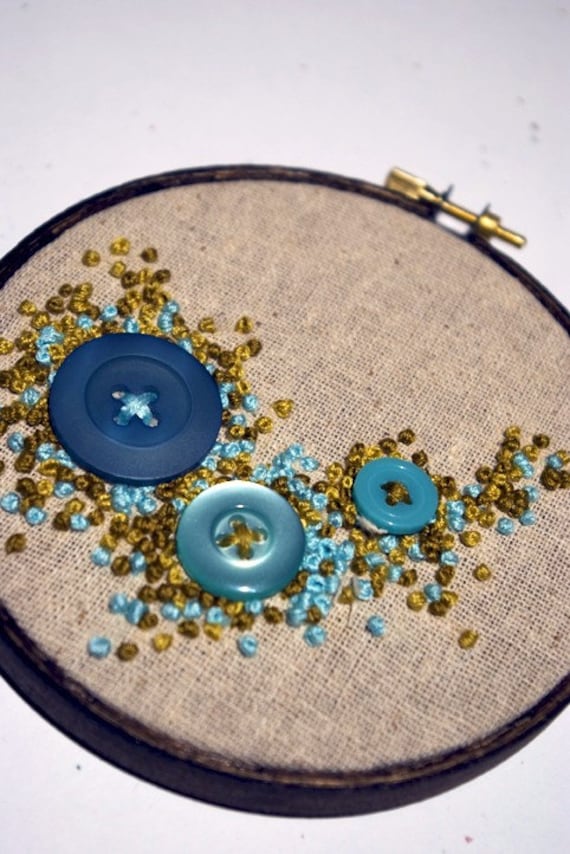 button growth embroidered wall hanging