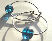 Sterling silver hoops with aqua blue art glass bead