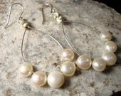 White fresh water pearls on sterling silver earring hoops