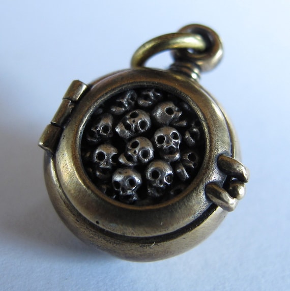 steampunk mourning locket SKULL LOCKET bronze with sterling silver skulls