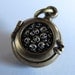 steampunk mourning locket SKULL LOCKET bronze with sterling silver skulls