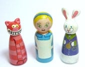 Three  painted peg dolls Alice in Wonderland
