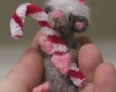 needle felted Christmas mouse with candy cane and quilt