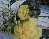 Wreath with Yellow Mums and Large Angel Wing Begonia Leaves