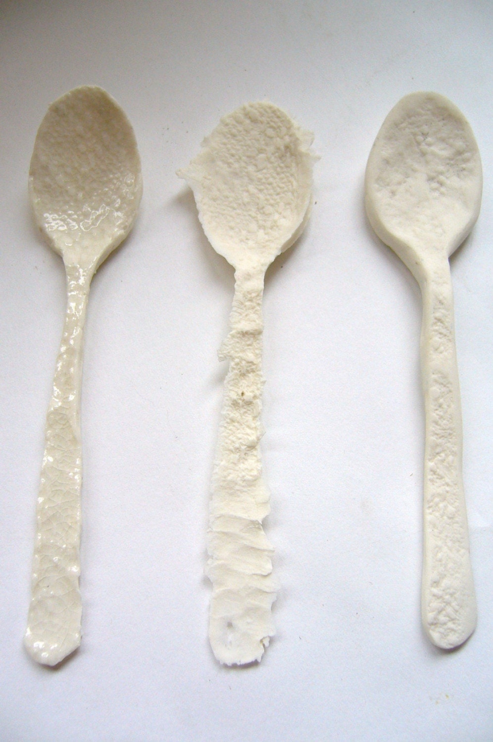A set of 3 unique decorative handmade porcelain spoons