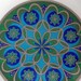 Festive melamine serving plate with shades of blue, green and gold