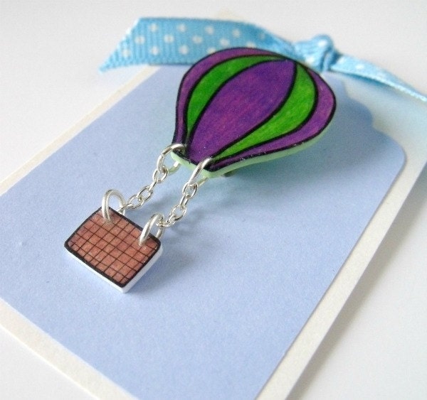 green and purple hot air balloon brooch with dangly basket
