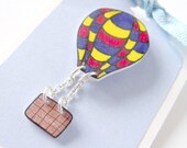 primary colours - red, yellow, blue hot air balloon brooch with dangly basket