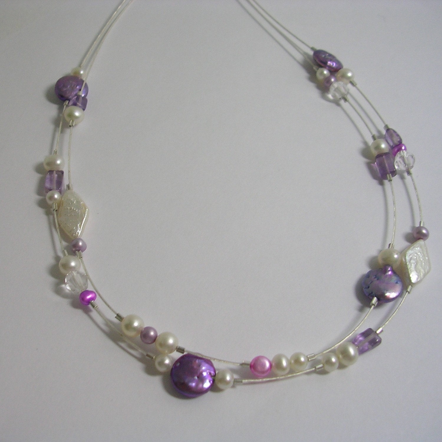Delicate pearl strand necklace