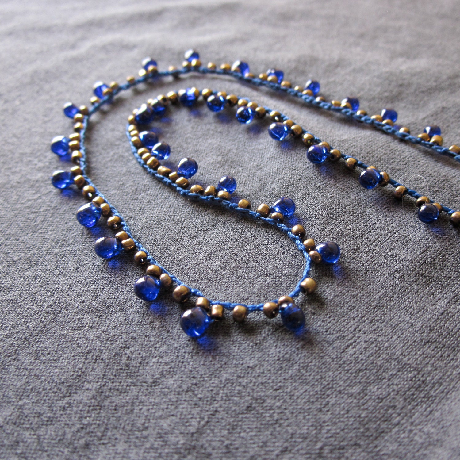 Cleopatra blue and gold beaded crocheted necklace