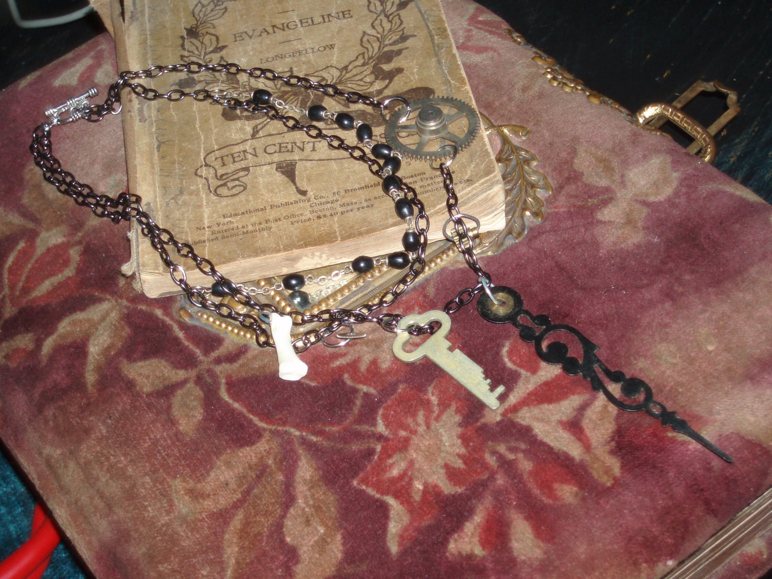 Steampunk crust punk goth inspired necklace antique key gear bone clock hand
