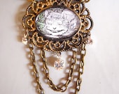 Cheshire Cat Necklace Tea Party Jewelry Alice in Wonderland Character in an Ornate frame Setting with Chains and Crystals