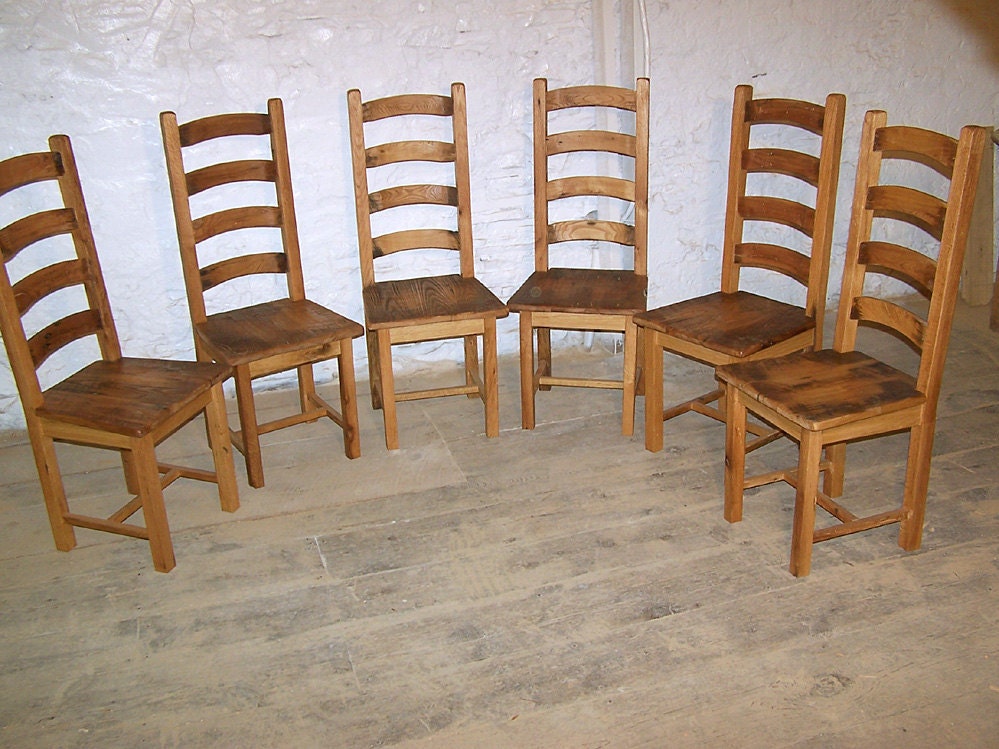 Wormy Chestnut Dining Chairs with Arched and Contoured Slats