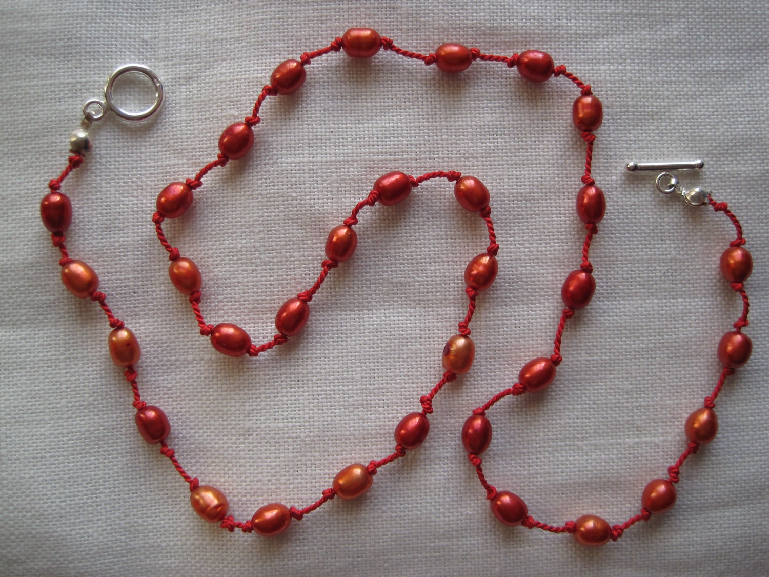 red pearl necklace