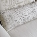 SOFA  bolster pillow in french script 9x23