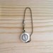 Fake watch with Antiqued Brass bead type chain bracelet. One-of-a-kind handmade Porcelain toy clock.