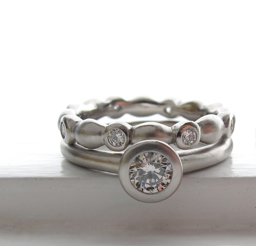 Classic diamond solitaire with Victorian Water ring wedding band
