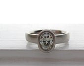 Ellipse Ring 950 palladium and Moissanite Engagement Solitaire