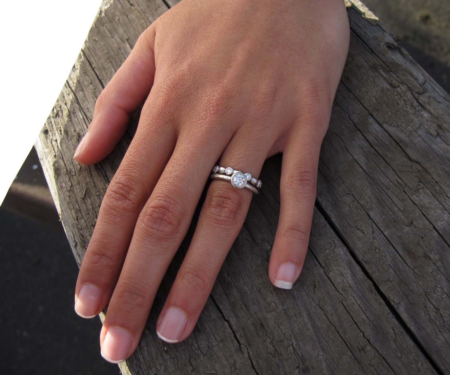 Diamond Pacific Ring his and hers engagement ring and matching wedding bands