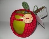 handmade crocheted apple cozy, apple coozy, or apple sweater in beautiful true red with green leaf  eco friendly