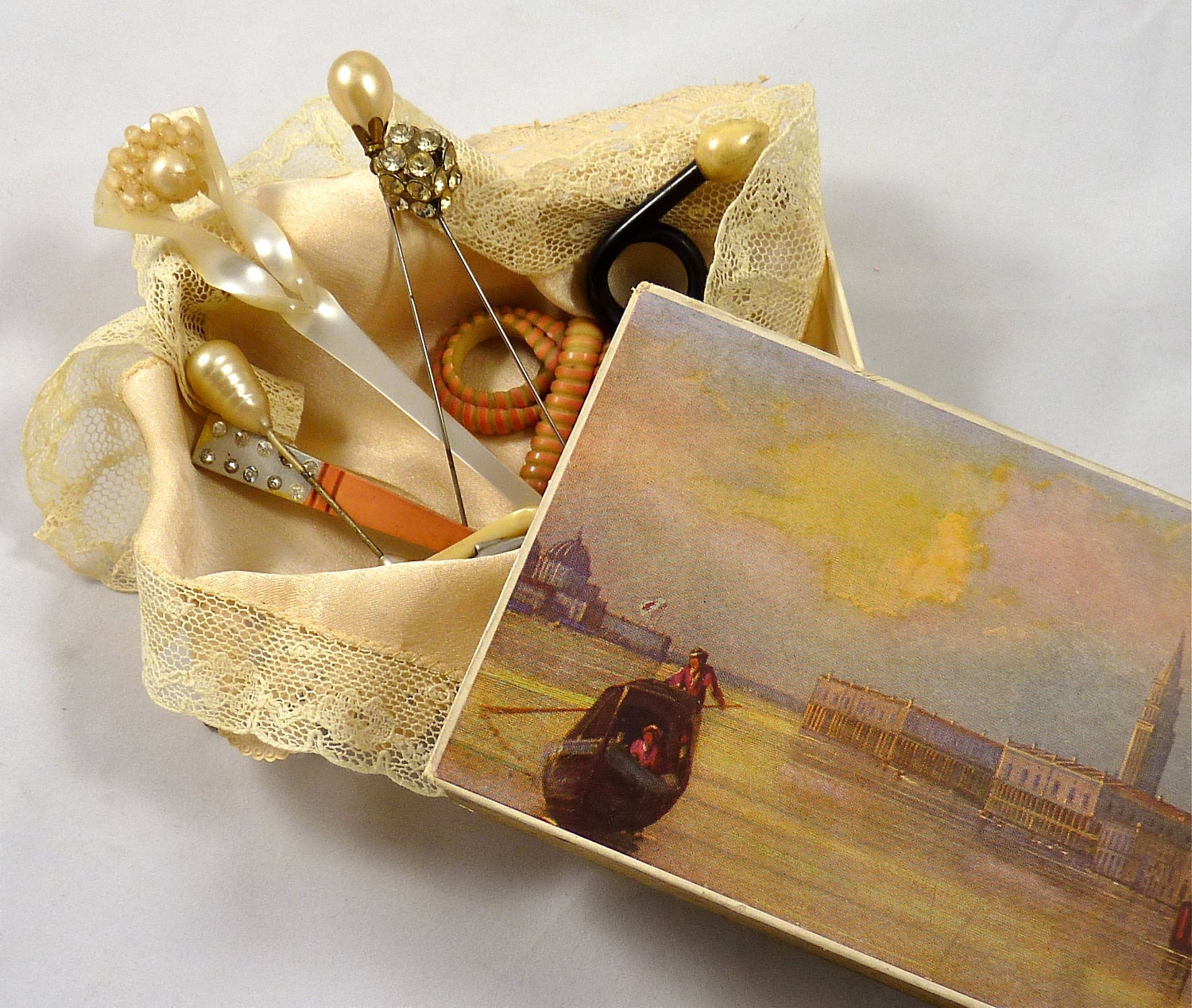 Vintage Candy Box Filled with Celluloid and Rhinestone Hat Decorations