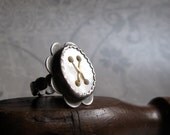 RING sterling silver with mother of pearl oval button and 22k gold X