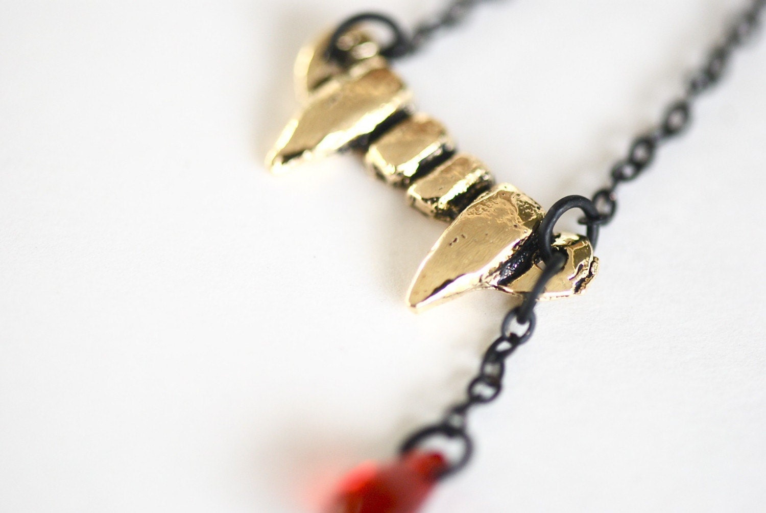 gold vampire fang - swarovski crystal - black necklace