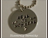 Hunger Games Real or Not Real Silver Disc Hand Stamped Pendant Custom Silver Metal