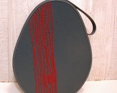 travel case with red tree