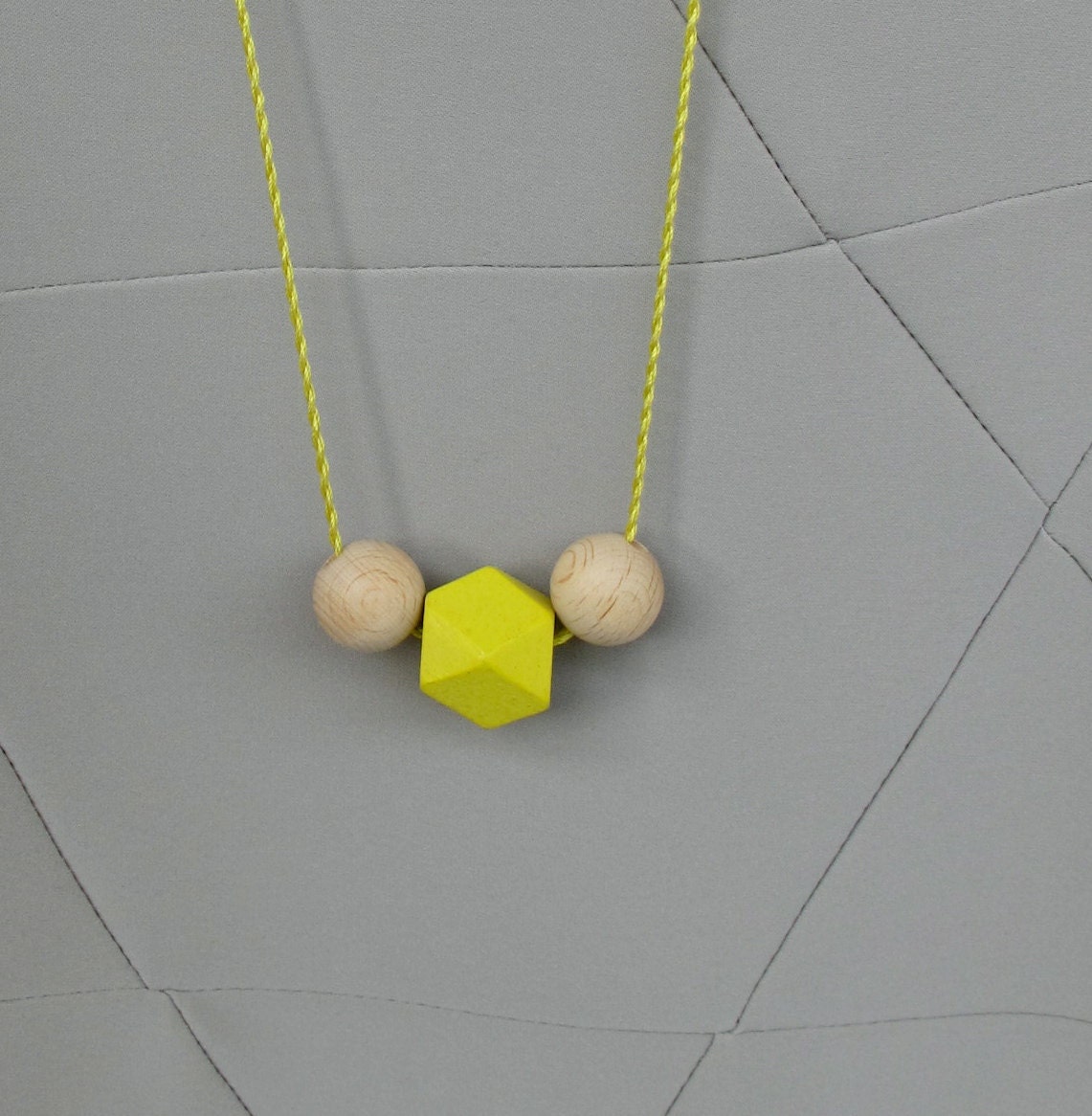 geometric necklace with faceted wooden neon beads silk string