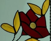 small 5 petal flower / stained glass window corner/ dk red and light amber/ bottom right