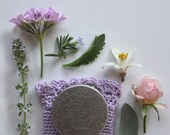 Gracing the Dawn Solid Natural Perfume - A Classic Chypre Floral Bouquet in a romantic round compact with a tapestry texture