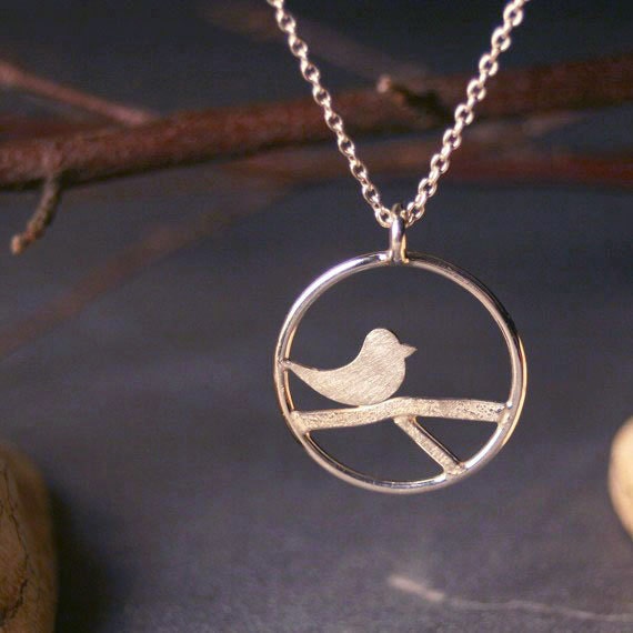 Modern sterling silver pendant with bird and branch