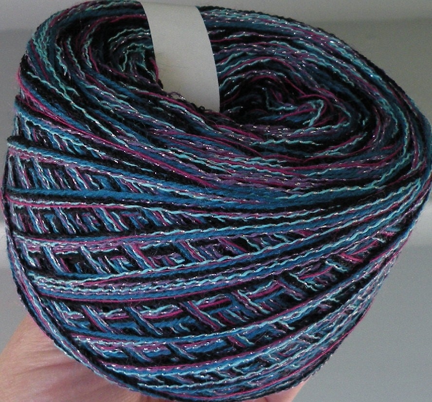 Yarn: 100 yards Andromeda blue teal purple magenta black glittering metallic wool yarn, worsted dk, knitting crochet