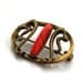 Vintage Brooch with Antique Gold toned metal scrollwork and Red Marble stone