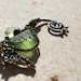 Tiny OLIVE seahorse wire wrapped seaglass pendant.