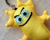 Soft keychain, whimsical creature with evil grin - makes great stocking stuffer, bright canary yellow