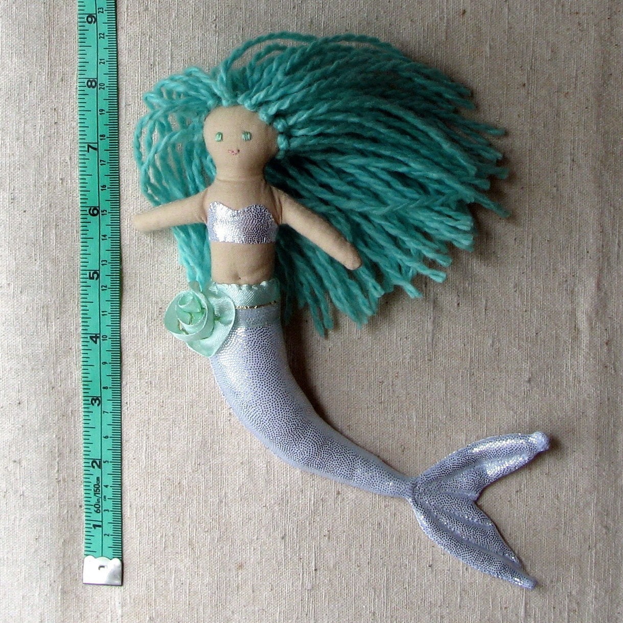 Mermaid doll, sparkly silver fishtail and aqua green hair